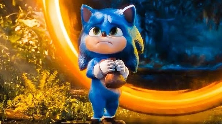 Young Sonic stands nervously in front of a ring portal in "Sonic the Hedgehog" (2020)