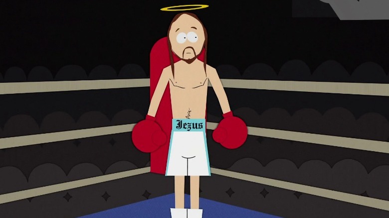 Jesus standing in boxing ring