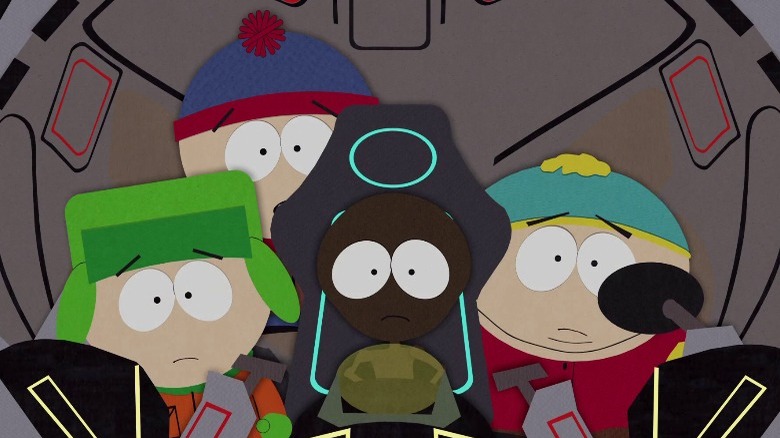 Stan, Kyle, Cartman, and Marvin flying spaceship