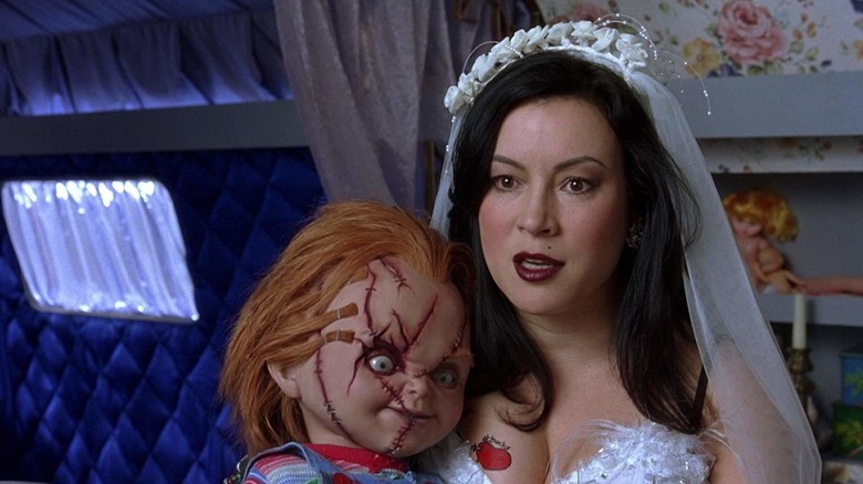 Jennifer Tilly with Chucky in lap