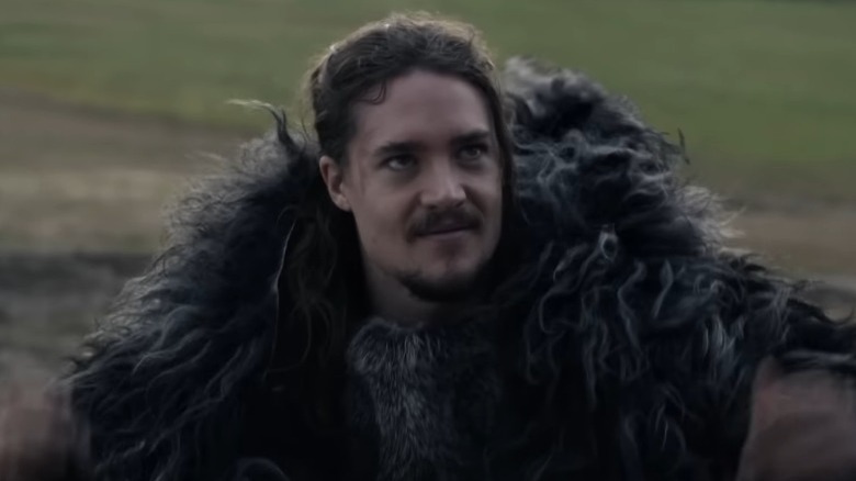 Uhtred wearing fur coat