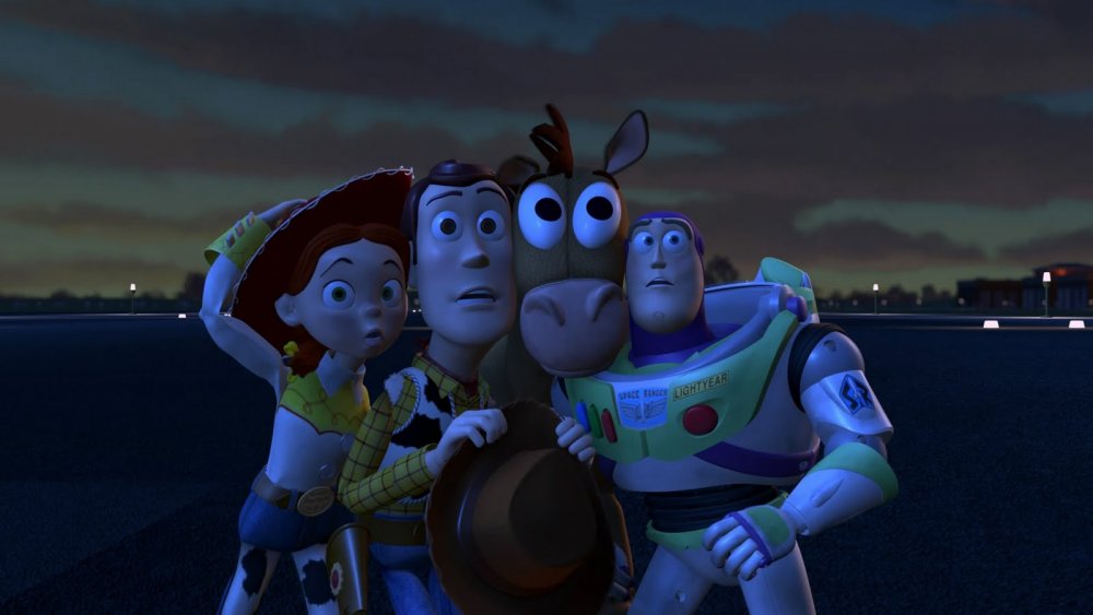 Jessie, Woody, Bullseye, and Buzz Lightyear on the runway at the end of Toy Story 2