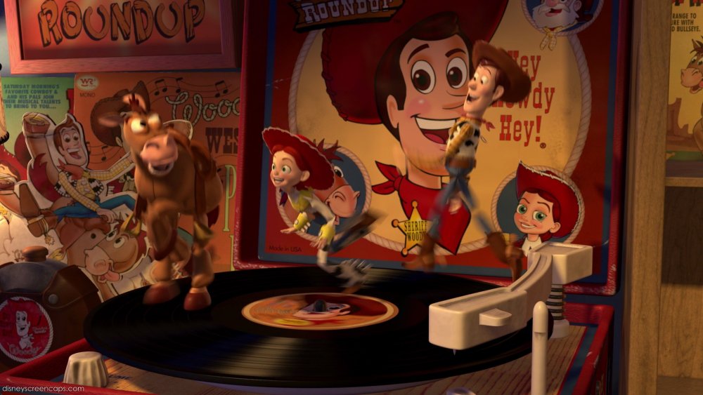 Woody, Jessie, and Bullseye dancing on a Woody's Roundup record in Toy Story 2