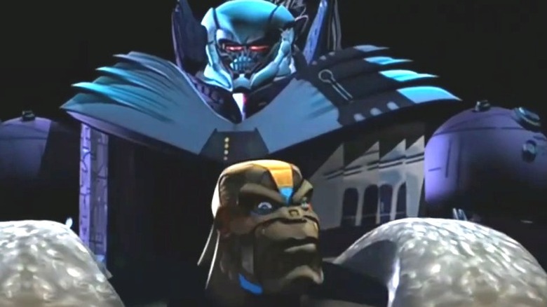 Megatron looms over Optimus Primal