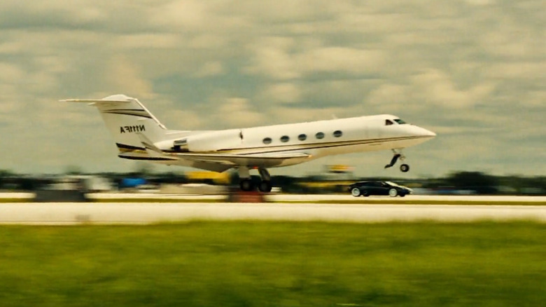 Frank Martin leaps from car to jet