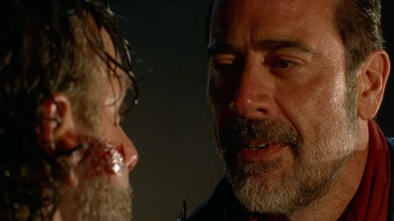 Negan and Rick staring at each other