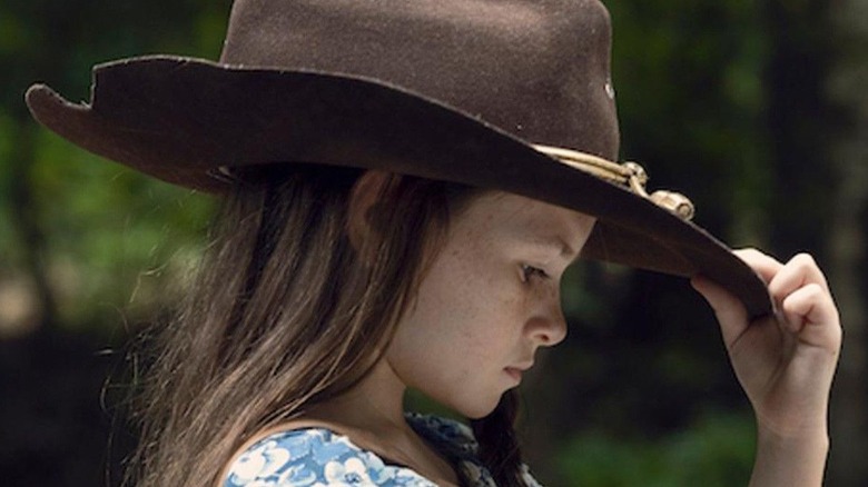 Judith Grimes in cowboy hat