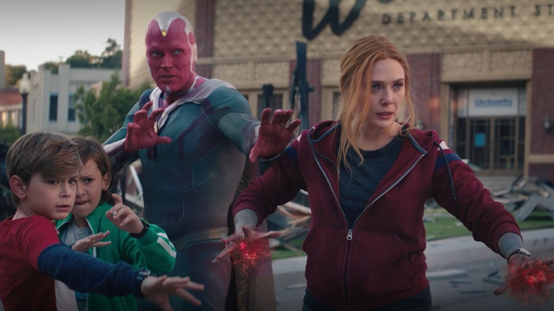 Wanda and Vision fighting alongside their kids