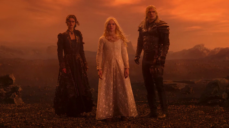 Ciri, Geralt and Yennefer go through the monolith