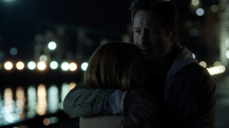 Mulder and Scully hugging