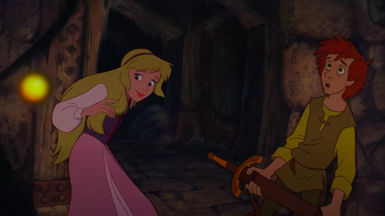 Princess Eilonwy and Taran hide from the Horned King