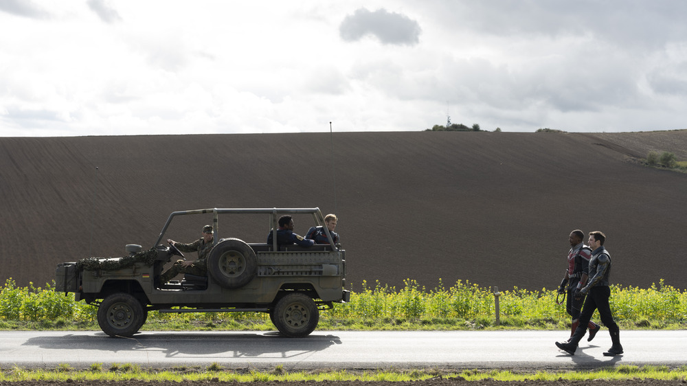 Sam and Bucky follow John Walker's jeep 