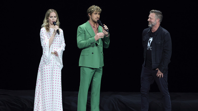 Ryan Gosling and Emily Blunt onstage at Cinema Con with David Leitch