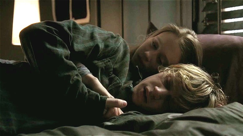 Tate and Violet cuddling