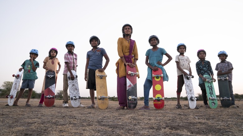 Village kids with skateboards