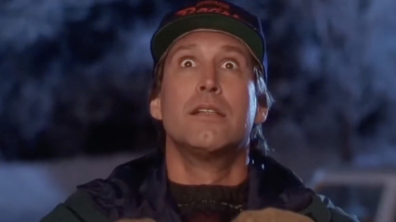 Chevy Chase looking at lights