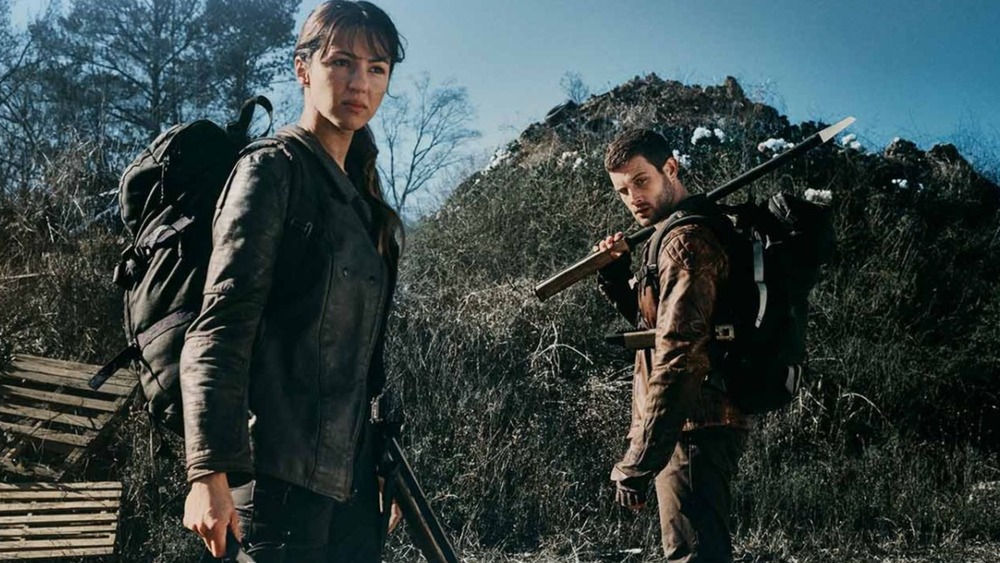 Annet Mahendru as Huck and Nico Tortorella as Felix on The Walking Dead: World Beyond