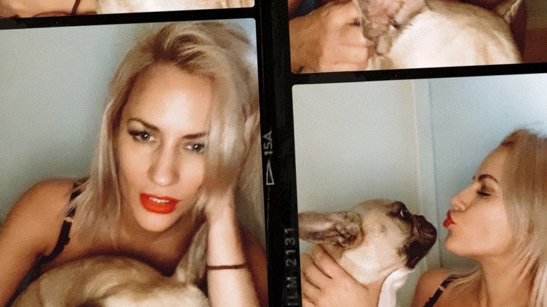 Caroline Flack posing with dog