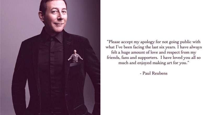 Paul Reubens smiling in suit