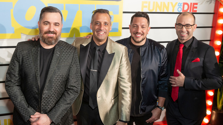 Brian Quinn, Joe Gatto, Sal Vulcano, and James Murray posing