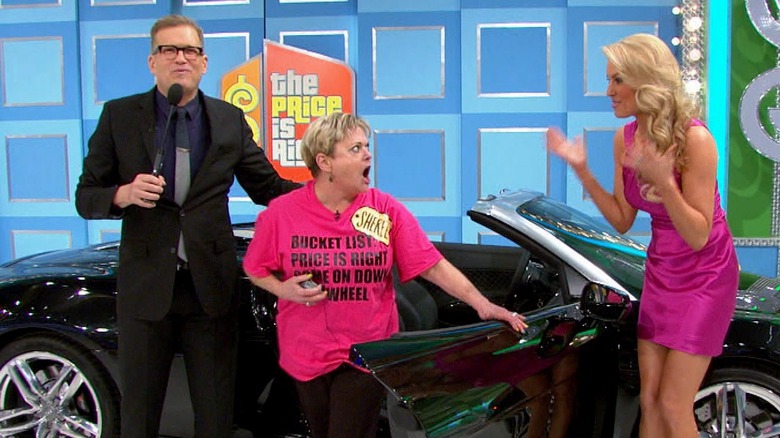 Drew Carey gives a car