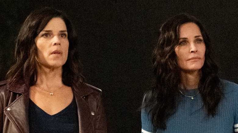 Neve Campbell as Sidney Prescott and Courteney Cox as Gale Weathers in Scream