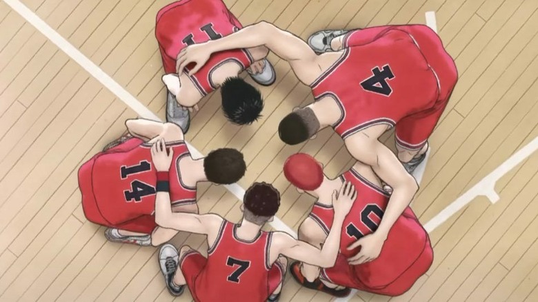 Basketball team in a huddle