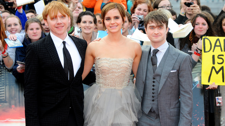 Rupert Grint, Emma Watson, and Daniel Radcliffe at Harry Potter premiere 