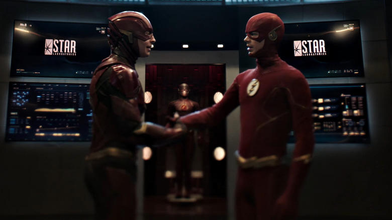 Two Flashes shaking hands