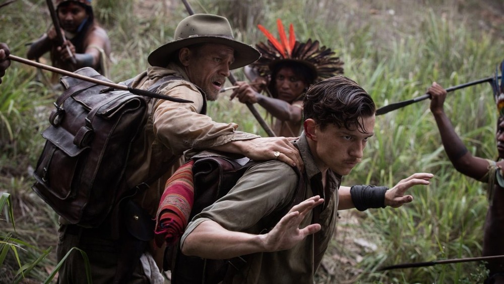 Percy and Jack Fawcett surrounded by Brazilian natives