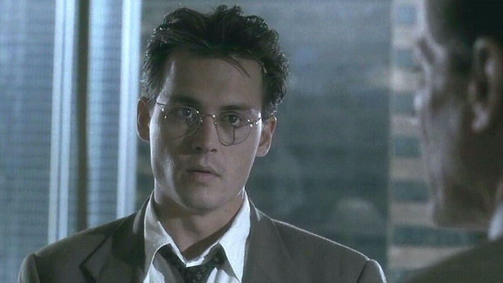 Johnny Depp wearing glasses