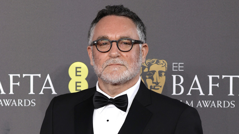 Colin Trevorrow posing in tuxedo