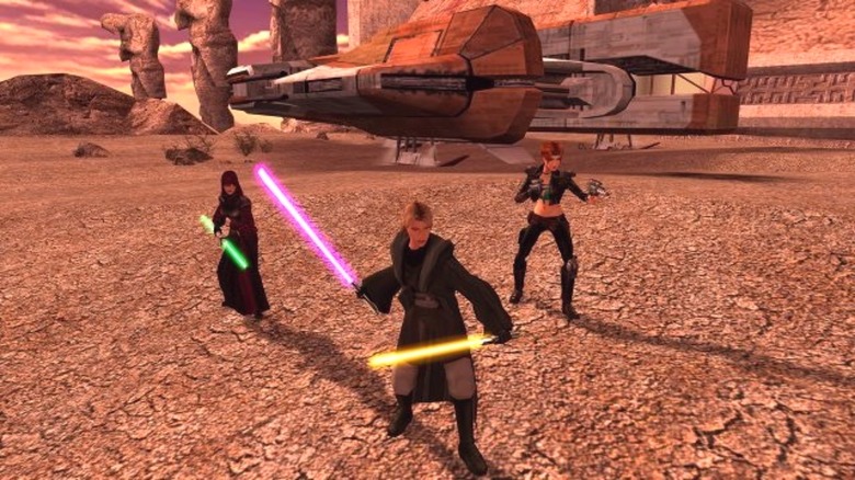 Jedi wielding lightsabers on planet