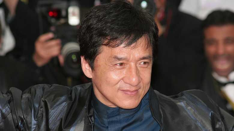 Jackie Chan with leather jacket