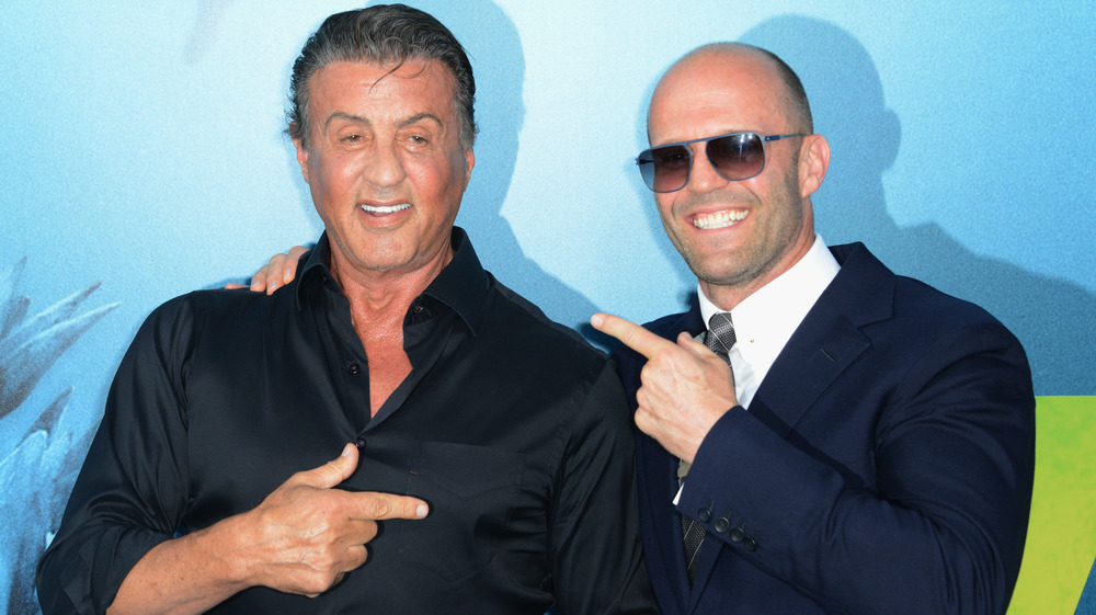 Sylvester Stallone and Jason Statham smiling