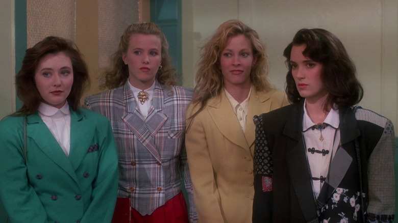 The Heathers standing together