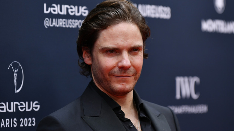 Daniel Bruhl smiling