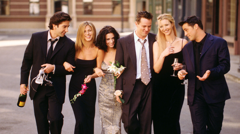 The Friends cast walking down the street