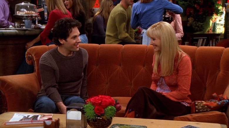 Mike Hannigan and Phoebe Buffay sitting