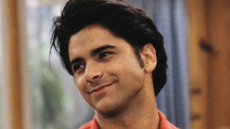 Uncle Jesse smiling