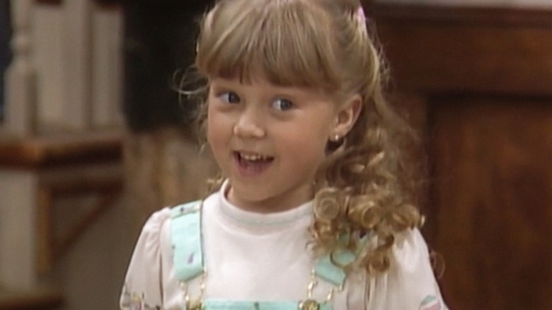 Young Stephanie Tanner with a big smile