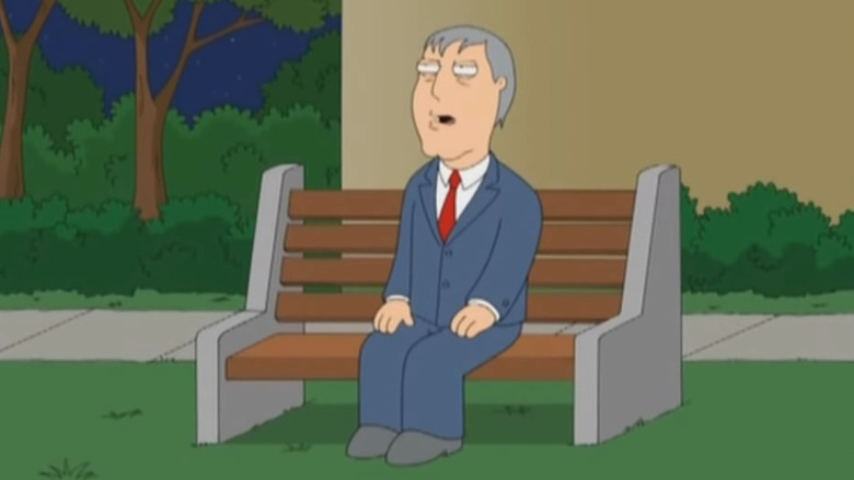 Mayor West sitting on a bench