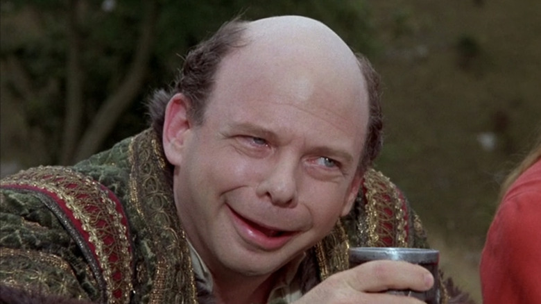 Vizzini smirking and toasting