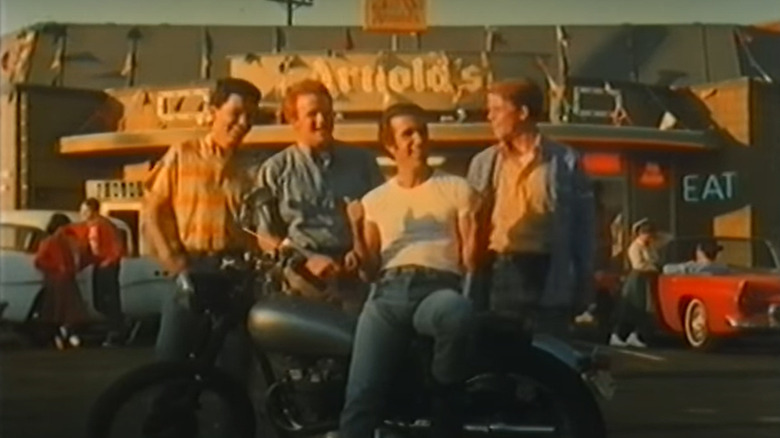 Happy Days cast on motorcycle