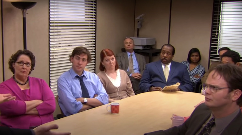 Dunder Mifflin employees conference table