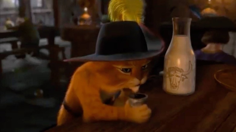 Puss in Boots drinking milk