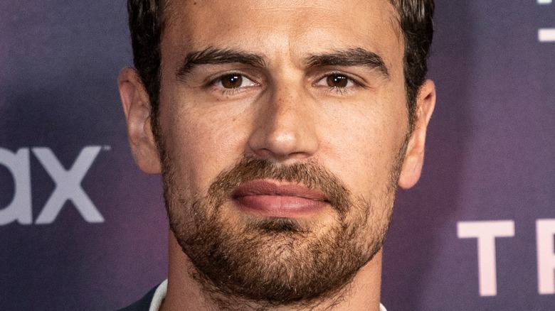 Theo James at event serious