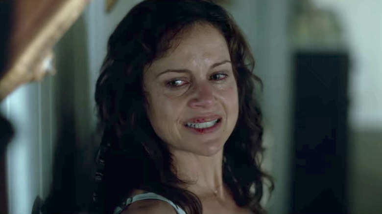 Carla Gugino gritting her teeth