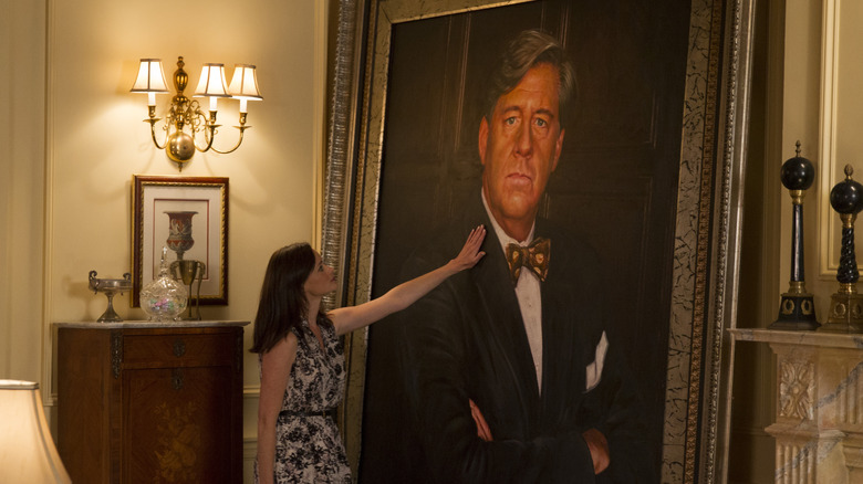 Rory looking at a portrait of Richard