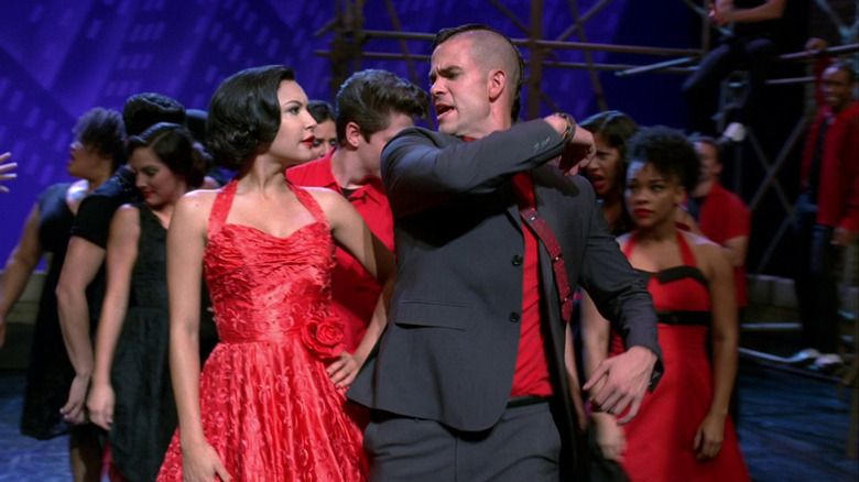 Santana and Puck performing